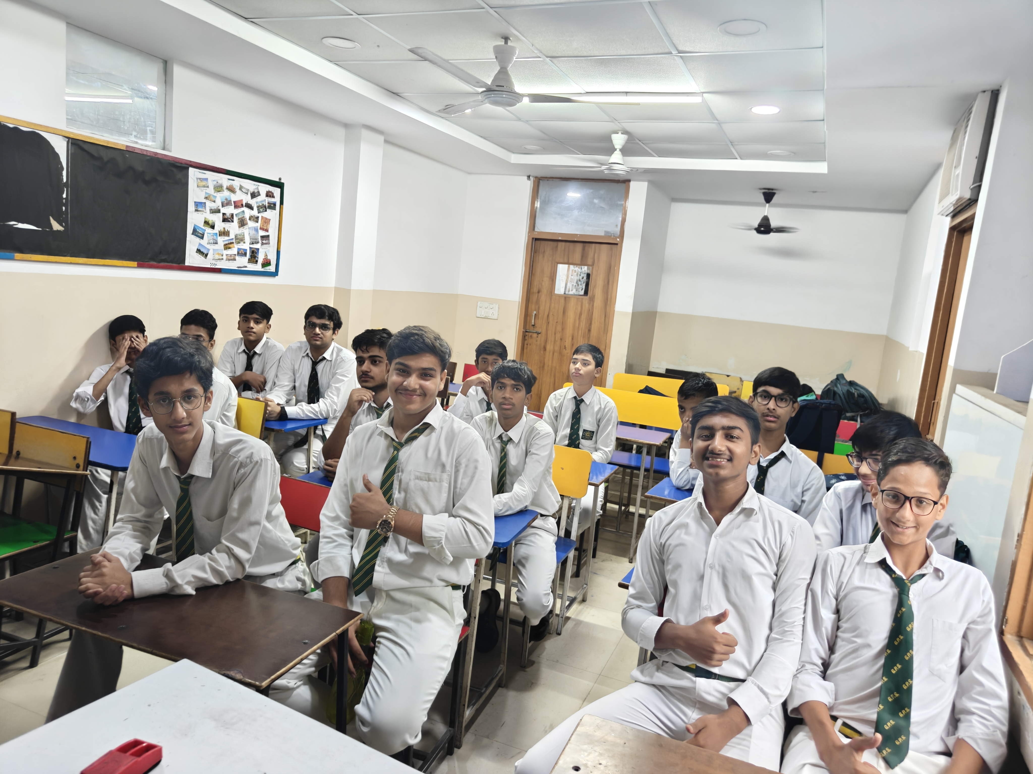 Teacher presenting a lesson to Garden Public School students